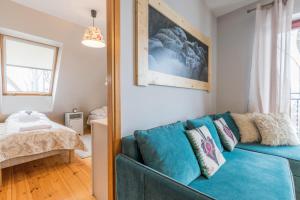 Posteľ alebo postele v izbe v ubytovaní Apartament Marmurki Zakopane