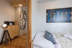 Posteľ alebo postele v izbe v ubytovaní Apartament Marmurki Zakopane