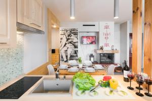 Kuchyňa alebo kuchynka v ubytovaní Apartament Marmurki Zakopane