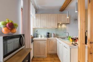 Kuchyňa alebo kuchynka v ubytovaní Apartament Marmurki Zakopane