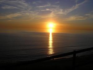 Lever ou coucher de soleil vu de la maison de vacances ou à proximité