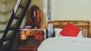 Katil atau katil-katil dalam bilik di Love nostalgia No. 53 B&B