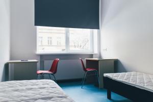 Voodi või voodid majutusasutuse Ülemiste Airport Hostel toas