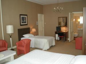 Una cama o camas en una habitación de Hotel Excelsior