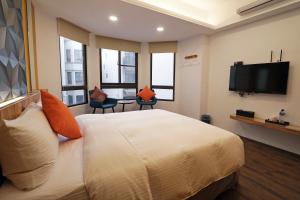Een TV en/of entertainmentcenter bij Penghu Little Apple B&B
