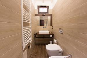 Ein Badezimmer in der Unterkunft Arena Luxury Rooms