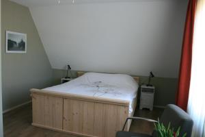 Postel nebo postele na pokoji v ubytování B&B 't Meulweegje