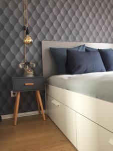Ένα ή περισσότερα κρεβάτια σε δωμάτιο στο Design Apartment Porto Downtown