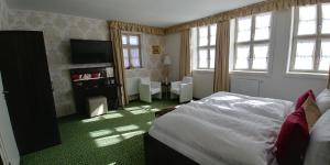Krevet ili kreveti u jedinici u okviru objekta Hotel Alte Brennerei