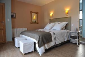 Katil atau katil-katil dalam bilik di Le Clos du Pontet