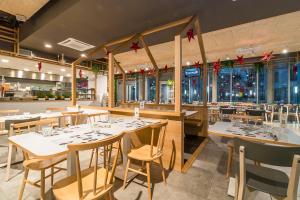 Reštaurácia alebo iné gastronomické zariadenie v ubytovaní Hotel Campus Sanpaolo