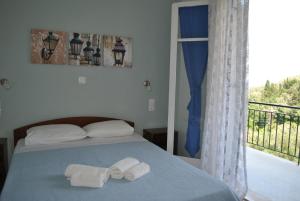 Voodi või voodid majutusasutuse Hotel Helios Splendid toas