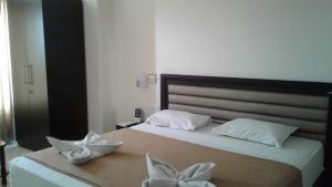 Postel nebo postele na pokoji v ubytování Rio Grande Residency