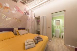 Кровать или кровати в номере Fonte Gaia Experience