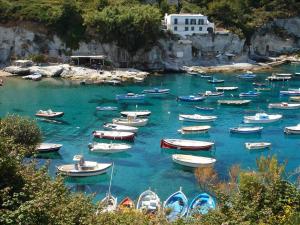 a bunch of boats in a body of water at Maridea - Donatino a Mare in Ponza