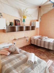 Katil atau katil-katil dalam bilik di Il Veliero Romantico