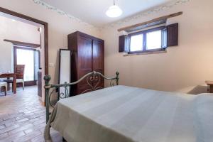 Posteľ alebo postele v izbe v ubytovaní La casina degli olivi