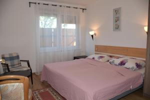 Posteľ alebo postele v izbe v ubytovaní Lenart House 1