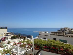 a view of the ocean from a building at Hotel Villa Delle Palme in Positano in Positano