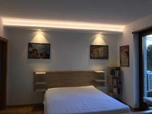 Ένα ή περισσότερα κρεβάτια σε δωμάτιο στο Casa Chiara