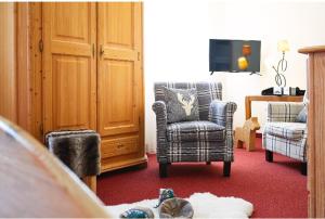TV a/nebo společenská místnost v ubytování Hotel Haus Keuthen
