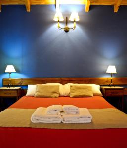 Cama ou camas em um quarto em Condor De Los Andes