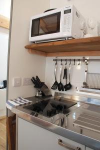 A kitchen or kitchenette at Bull Farm Studios 