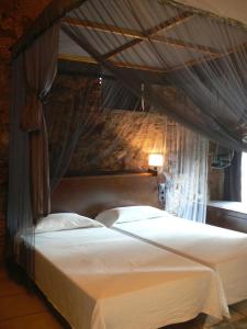 Een bed of bedden in een kamer bij Can Seuba