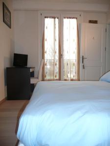 Postel nebo postele na pokoji v ubytování Agriturismo Campoverde
