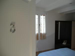 Postel nebo postele na pokoji v ubytování Agriturismo Campoverde