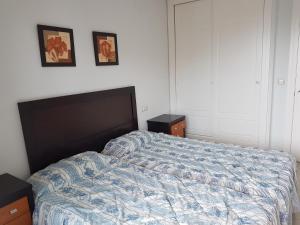 Posteľ alebo postele v izbe v ubytovaní GEMELOS 26 APARTMENTS - Benidormland