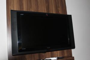 TV a/nebo společenská místnost v ubytování Laleli Hotel Izmir