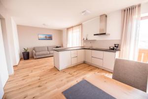 A kitchen or kitchenette at Weinberg Apartments