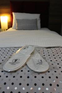 Postel nebo postele na pokoji v ubytování Laleli Hotel Izmir