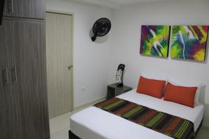 Ένα ή περισσότερα κρεβάτια σε δωμάτιο στο Hotel Pereira 421
