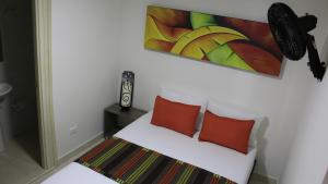 Ένα ή περισσότερα κρεβάτια σε δωμάτιο στο Hotel Pereira 421