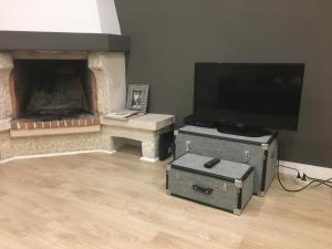 TV a/nebo společenská místnost v ubytování Holiday Cascais Apartment