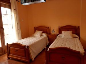 Postel nebo postele na pokoji v ubytování Escapada Delux