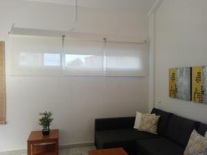 Ein Sitzbereich in der Unterkunft Cozy Loft Torremolinos