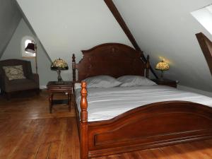 Una cama o camas en una habitación de Hotel Villa Schneverdingen