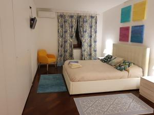 Postel nebo postele na pokoji v ubytování La Casa Degli Ospiti