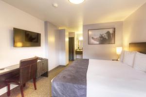 Kama o mga kama sa kuwarto sa Hotel Ruby