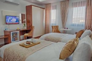 Letto o letti in una camera di New Hotel
