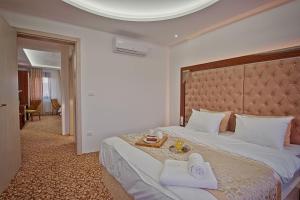Letto o letti in una camera di New Hotel