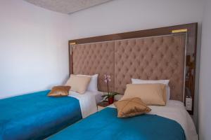 Letto o letti in una camera di New Hotel