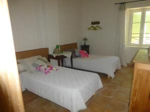 Postel nebo postele na pokoji v ubytování B&B Les Argiles
