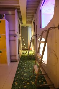 Imagine din galeria proprietății Wuhan Worry-free Capsule Hotel în Wuhan