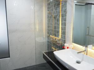 Ванная комната в Samui City Hotel