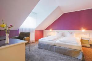 Postel nebo postele na pokoji v ubytování Hotel - Restaurant Erich Rödiger
