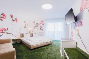 TV a/nebo společenská místnost v ubytování Hotel - Restaurant Erich Rödiger